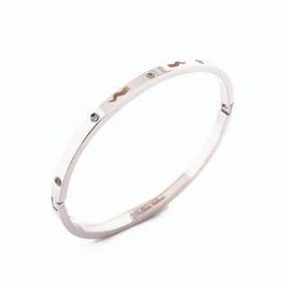 The Iconica Bangle bracelet in steel, with embedded Zircon and external engraving