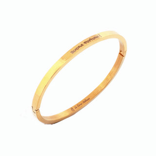 L'Iconica bangle bracelet in steel, "Buona Fortuna" engraving on the outside
