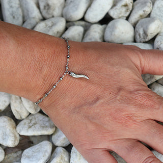 Silver Steel Bracelet – Beaded Chain & Horn Pendant | Eleganza