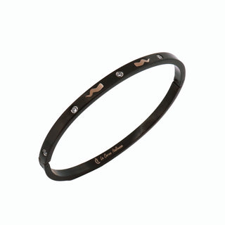 The Iconica Bangle bracelet in steel, with embedded Zircon and external engraving